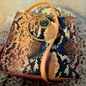 Handbag snakeskin print w long strap or carry with gold handles